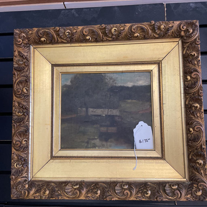 Landscape with gold scroll frame artwork