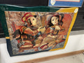 Man painting women artwork